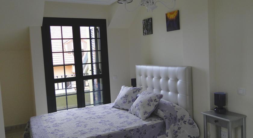 Apartamentos El Pinedo Noja Rum bild