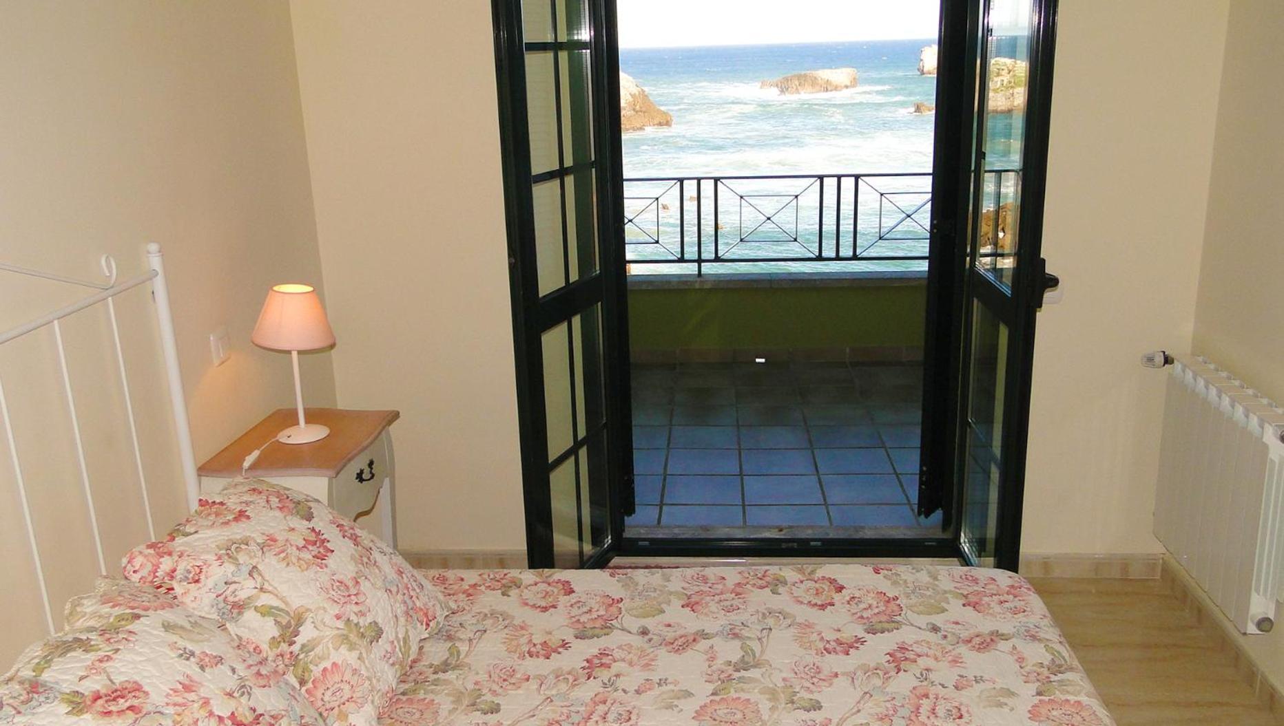 Apartamentos El Pinedo Noja Rum bild