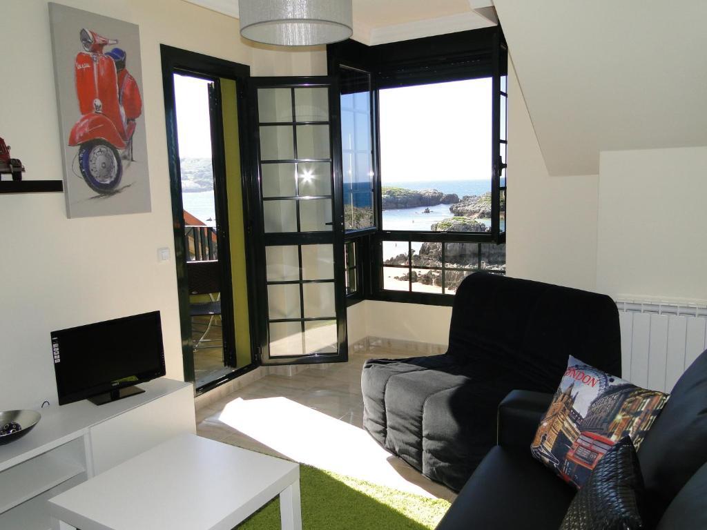 Apartamentos El Pinedo Noja Rum bild